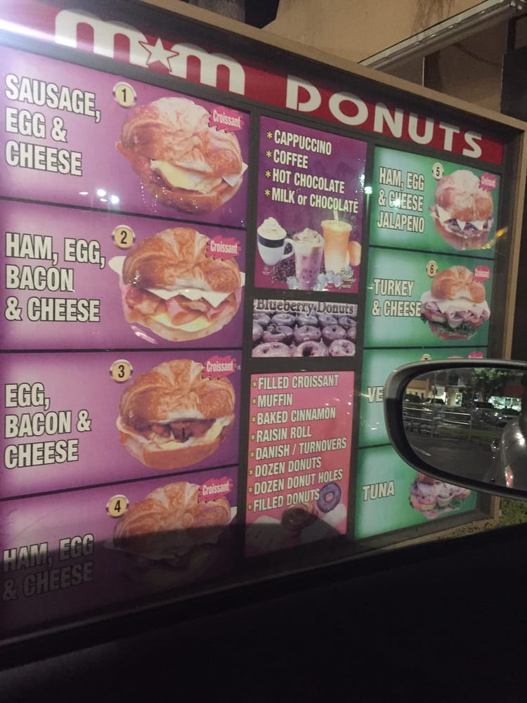 Drive-thru board of breakfast croissant sandwiches